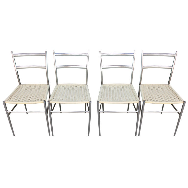 Gio Ponti Chrome 
Vinyl chairs