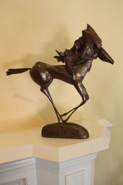 Bronze Sculpture of a woman riding a horse