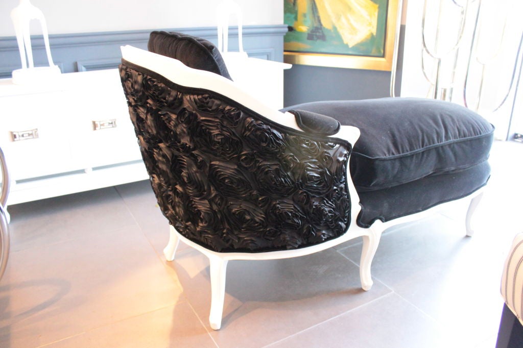 French Chaise restored with white lacquer and Black Belgium Velvet - the back portion is upholstered in large black satin Rosette's - whimsical and Sexy - chaise has cushion and two pillows.