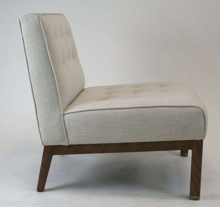Lovely mid-century slipper chair with graceful curved front apron and brass sabot on the front legs. Nice lines give it a lovely apect from all sides.