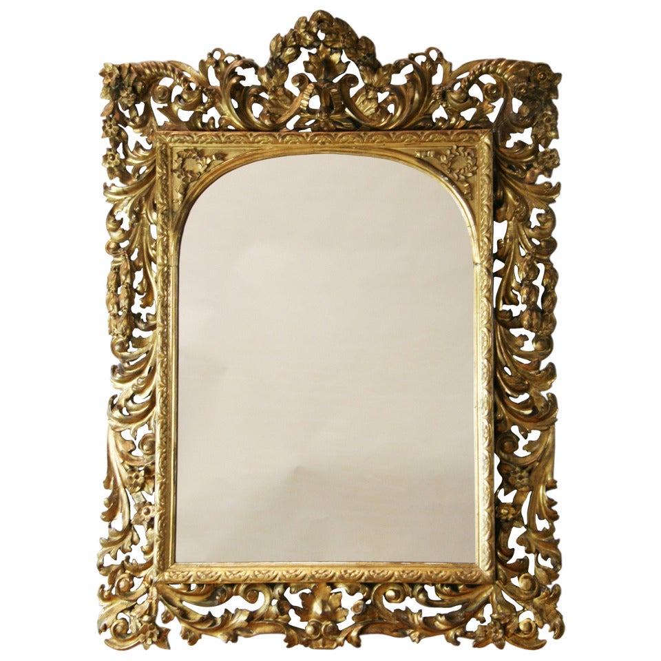 Miroir italien en bois doré sculpté du XIXe siècle