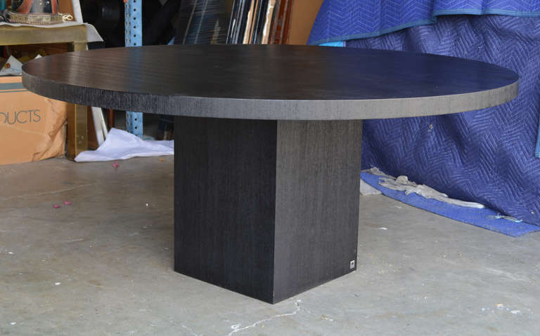 Beautiful blackened cerused oak dining table by Armani Casa. Metal tag on base