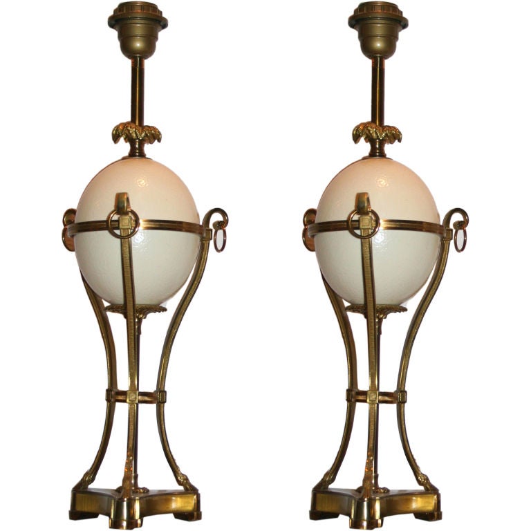 Paire de lampes en bronze doré représentant un œuf d'autruche par Charles en vente