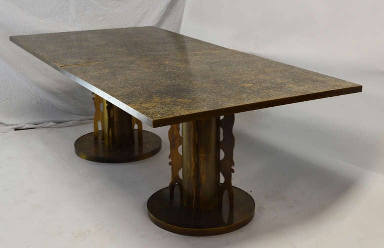 An extremely rare double pedestal dining table by Philip and Kelvin Laverne with original paper label. The table consists of two 44