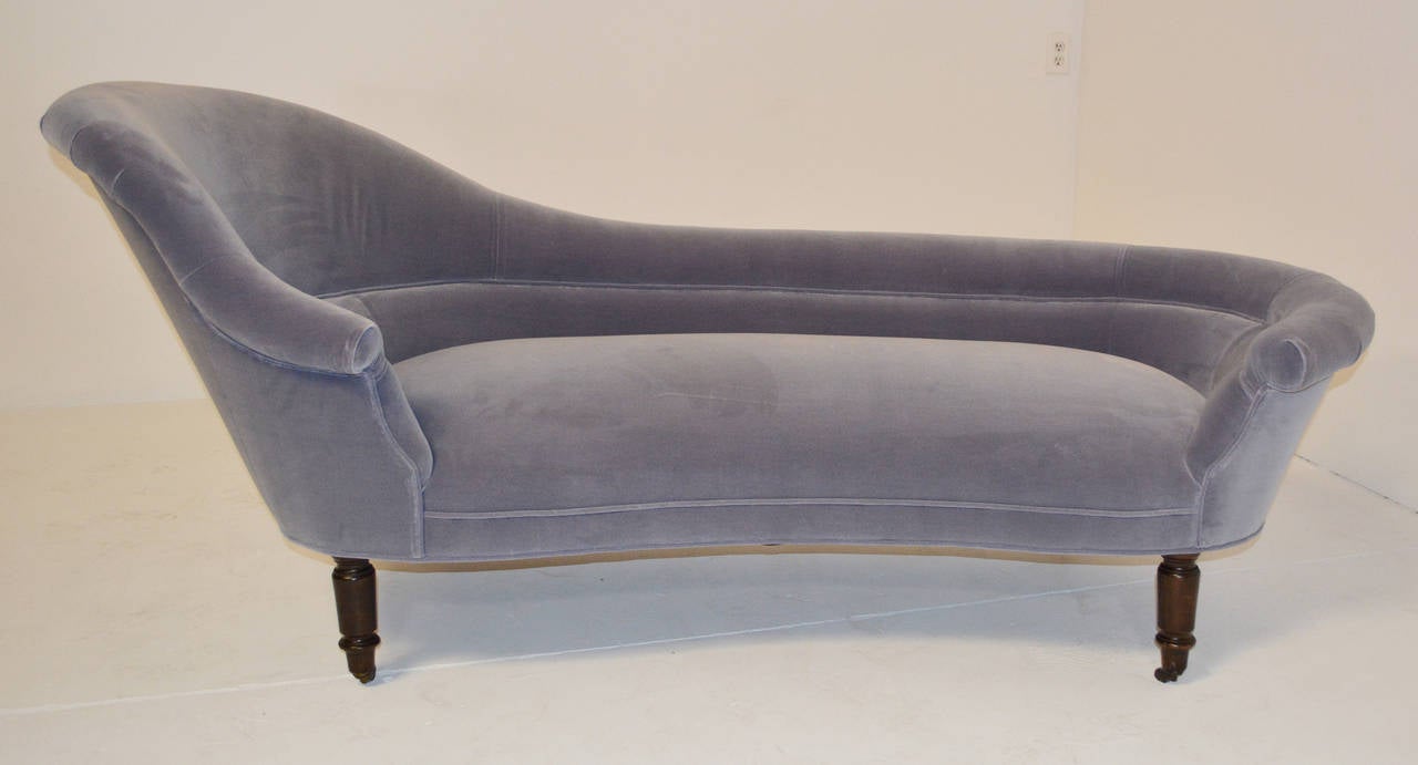 An exceptionally sculptural Victorian chaise with sinuous curves. Recently reupholstered.