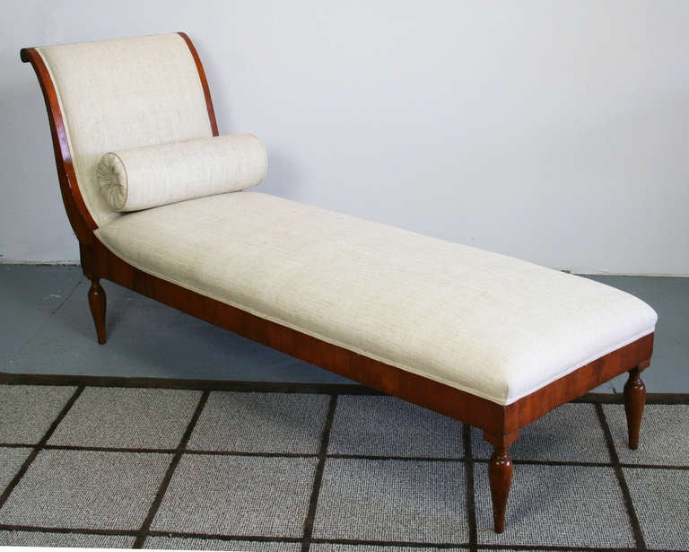 Lovely 19th C. Daybed in fruitwood with partially padded outcurved and scrolled armrest, with tight upholstered seat and back on delicate, turned legs. Truly exceptional chaise longue.