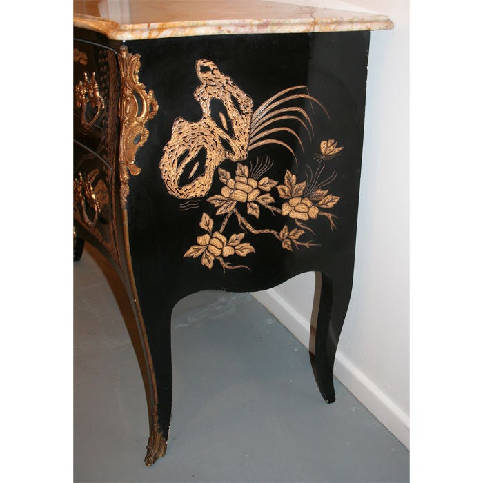 Beautiful chinoiserie 2 drawer commode with marble top. Black lacquer with incised gilt decoration and ormolu mounts. Very nice quality with dovetailed drawers. Marble top has an old repair which is fine. Good color to marble.