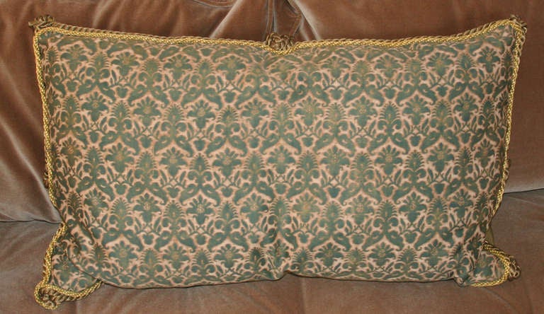 Lovely vintage pillow with antique Fortuny fabric face with gold and bronze metallic trim. Rare colors and lovely patina. Fabric is a heavier weight cotton. We've just acquired a large collection of vintage pillows made from antique textiles.