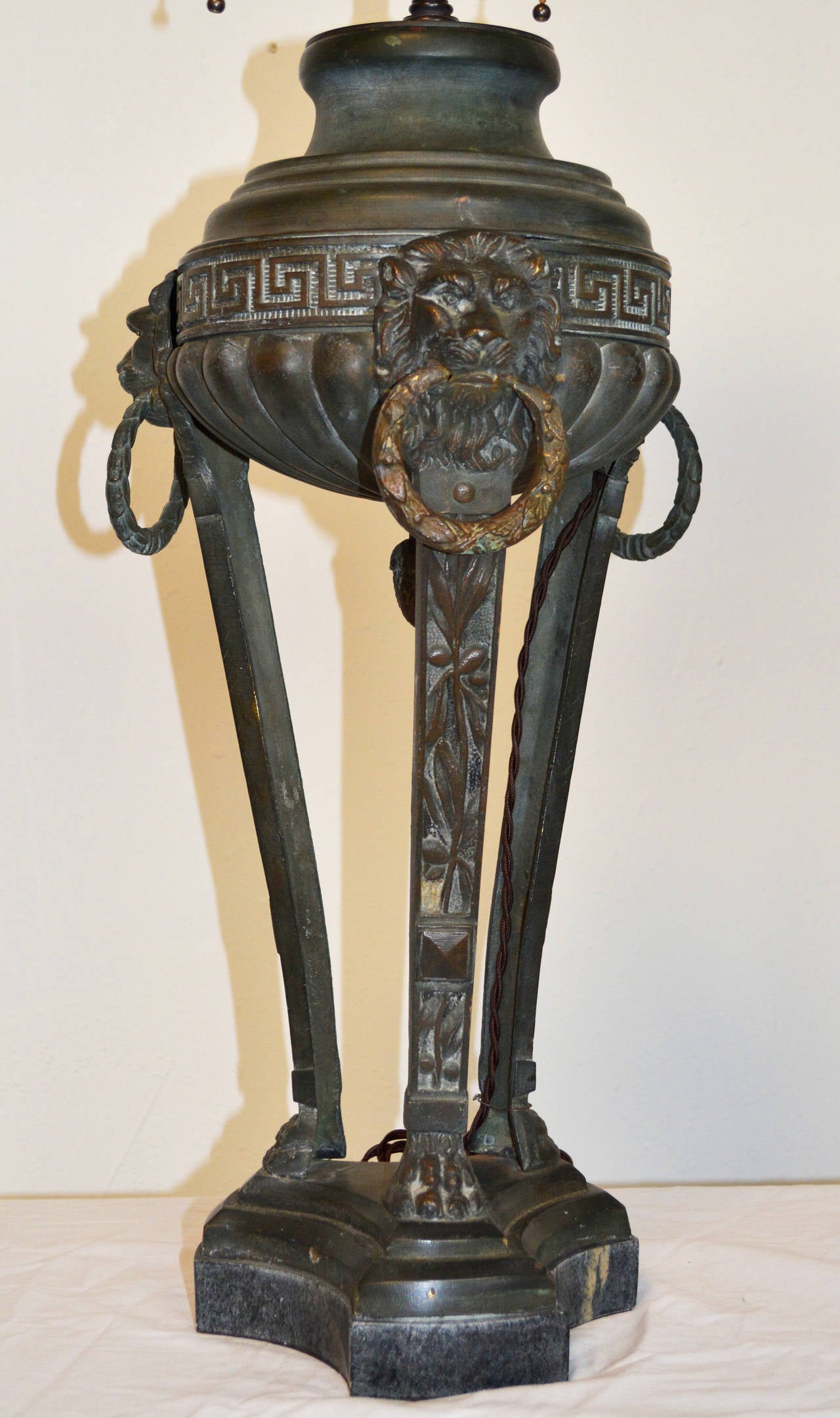 A wonderful pair of 19th Century bronze tripod 