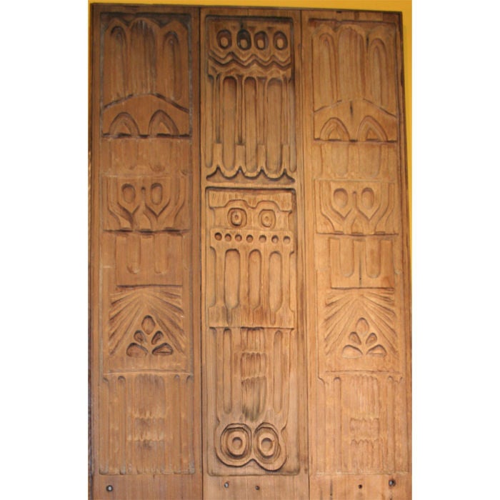 Set of three carved redwood panels, each comprising three 9