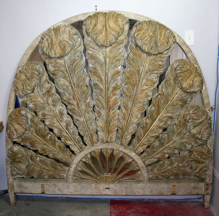 Truly unique carved headboard with consisting of 9 large Prince of Wales feathers on a mirrored background. Great carving and exceptional quality. Would fit a queen size or California king mattress. No hardware included.