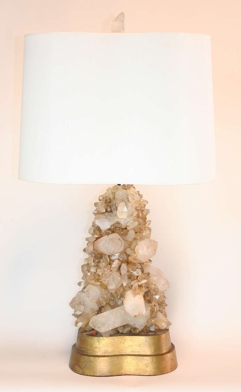 Truly magnificent quartz crystal lamp by Carole Stupell on a gilded biomorphic form wood base. Original custom shade and quartz crystal finial. 36" to top of shade (included), 19" to top of quartz crystal base.