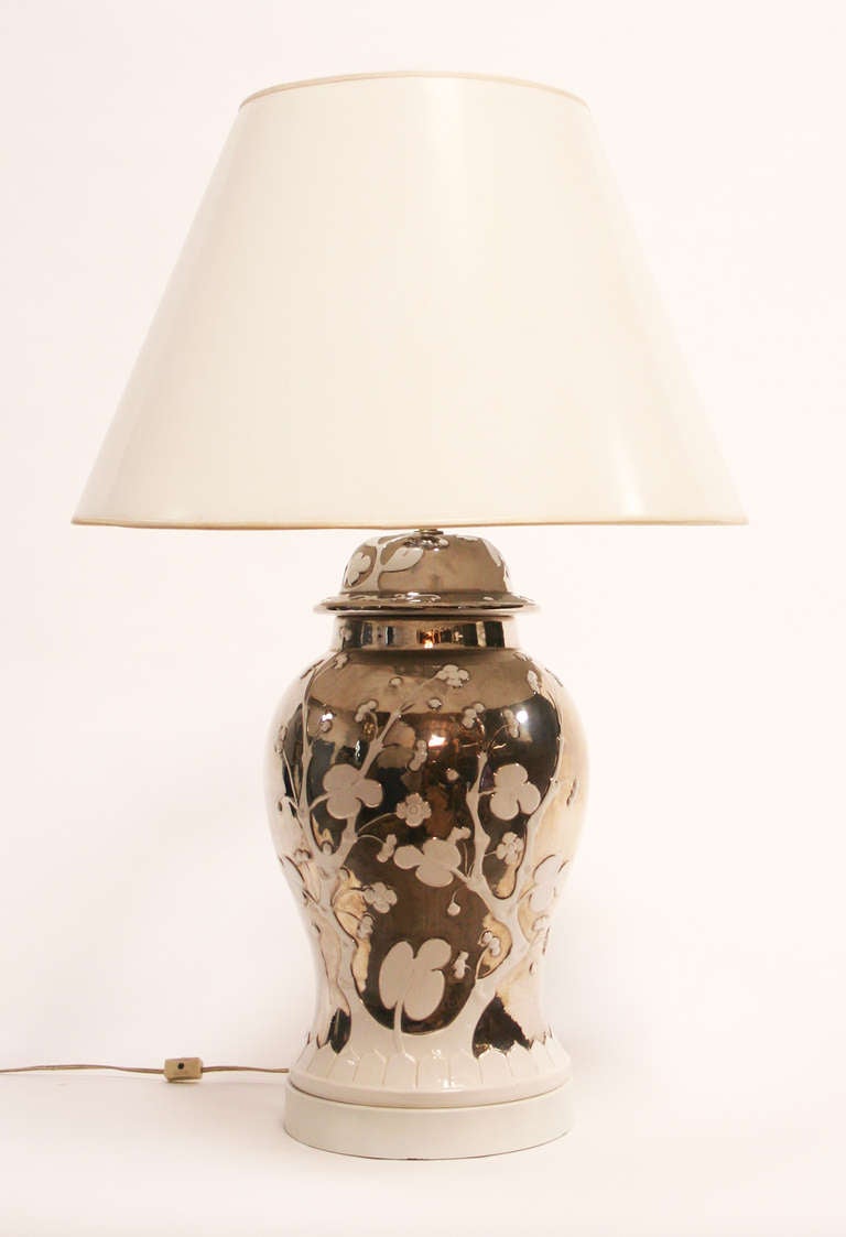 Stunning ginger jar lamp with stylized cherry trees in blanc de chine glaze on mercury glazed pottery. 23