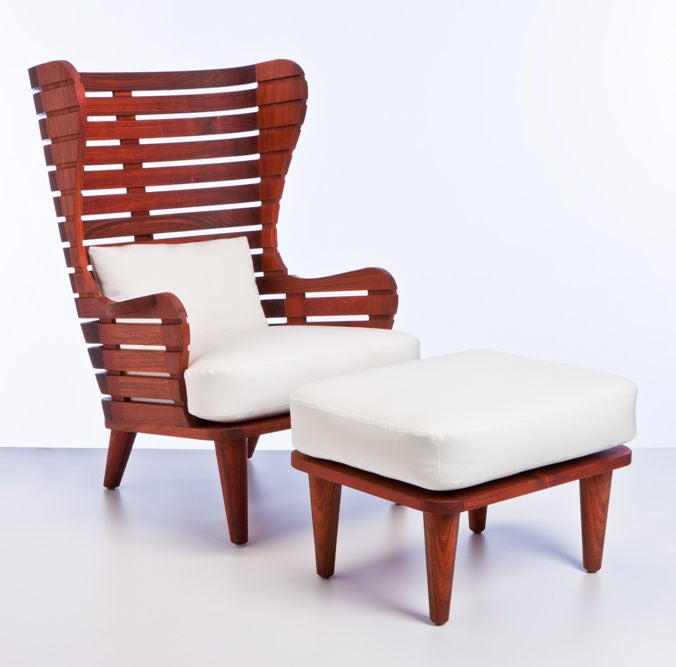 An indoor/outdoor wingback chair (ottoman sold seperately) made of Machiche wood, which has excellent weathering properties similar to teak. This is a new item that can be made to order, various finishes available. 

6 Week Lead Time

Chair
