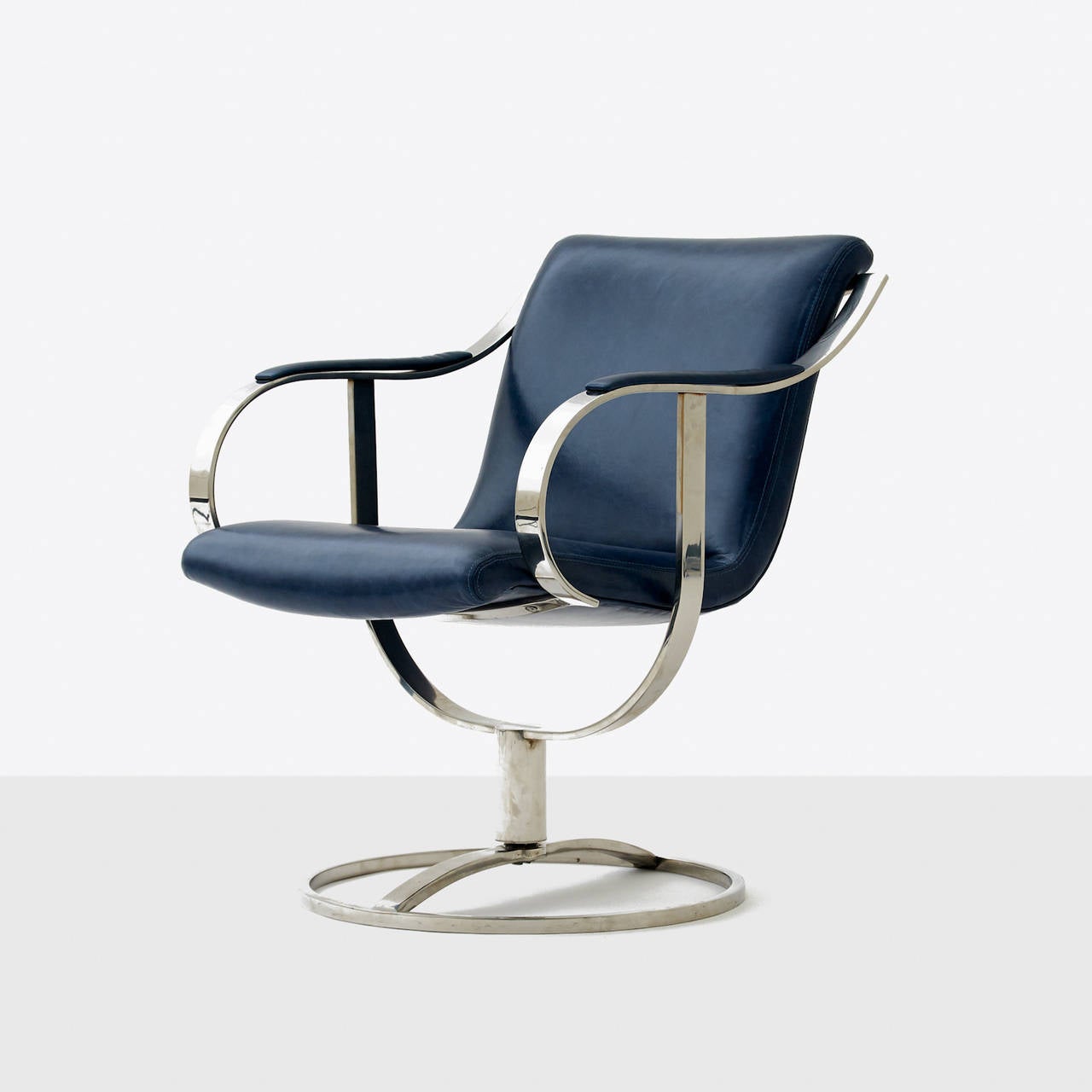 A set of four 450 series chairs by Gardner Leaver for Steelcase. Newly restored in a deep sea blue jerry pair of leather swivel base in chrome-plated steel.
