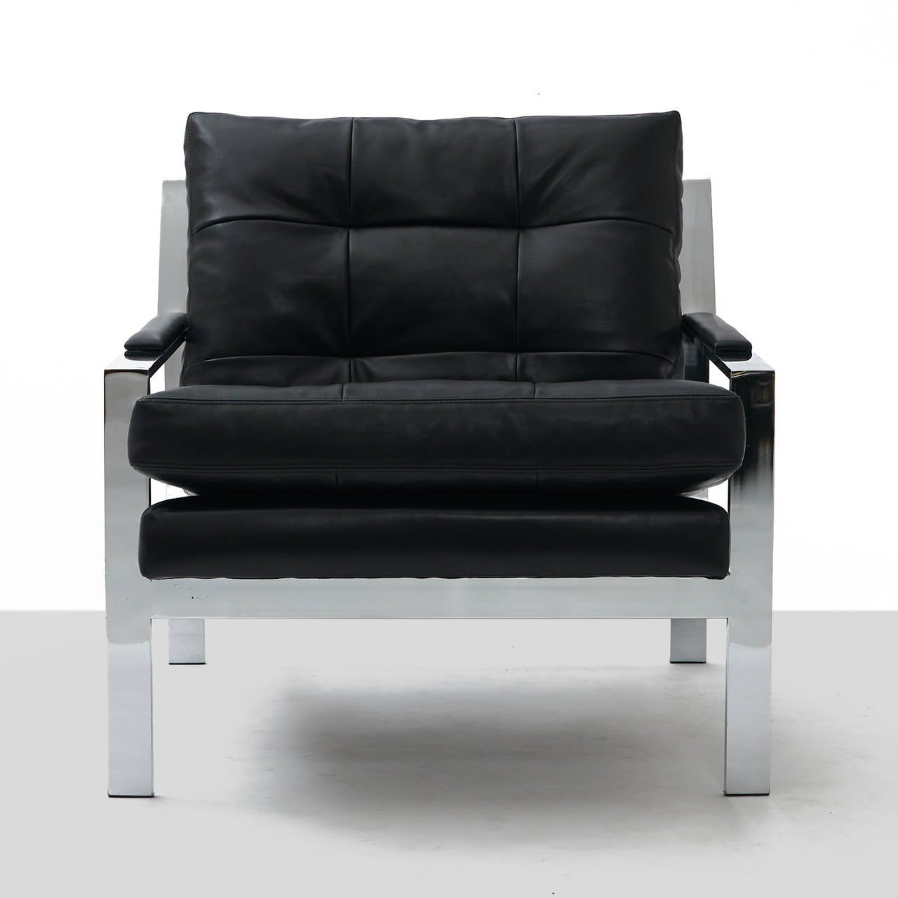 American Pair of Black Leather and Chrome Lounge Chairs