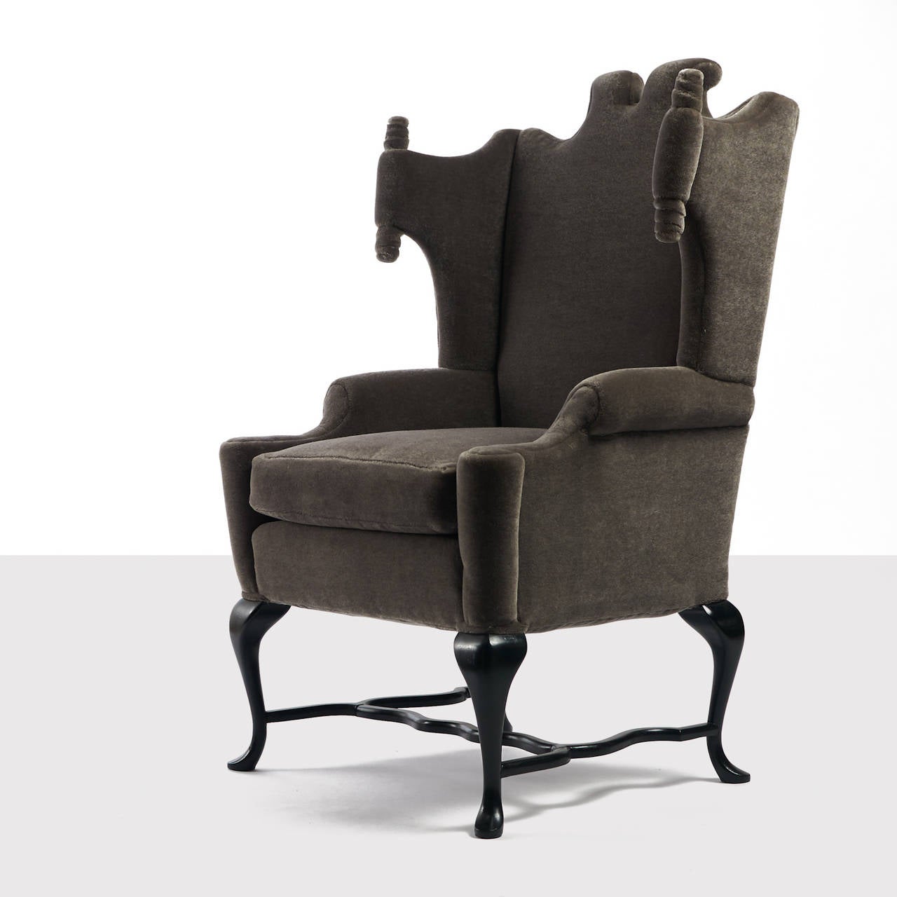 A rare pair of wingback chairs by Mexican Designer/decorator Arturo Pani. Interesting 