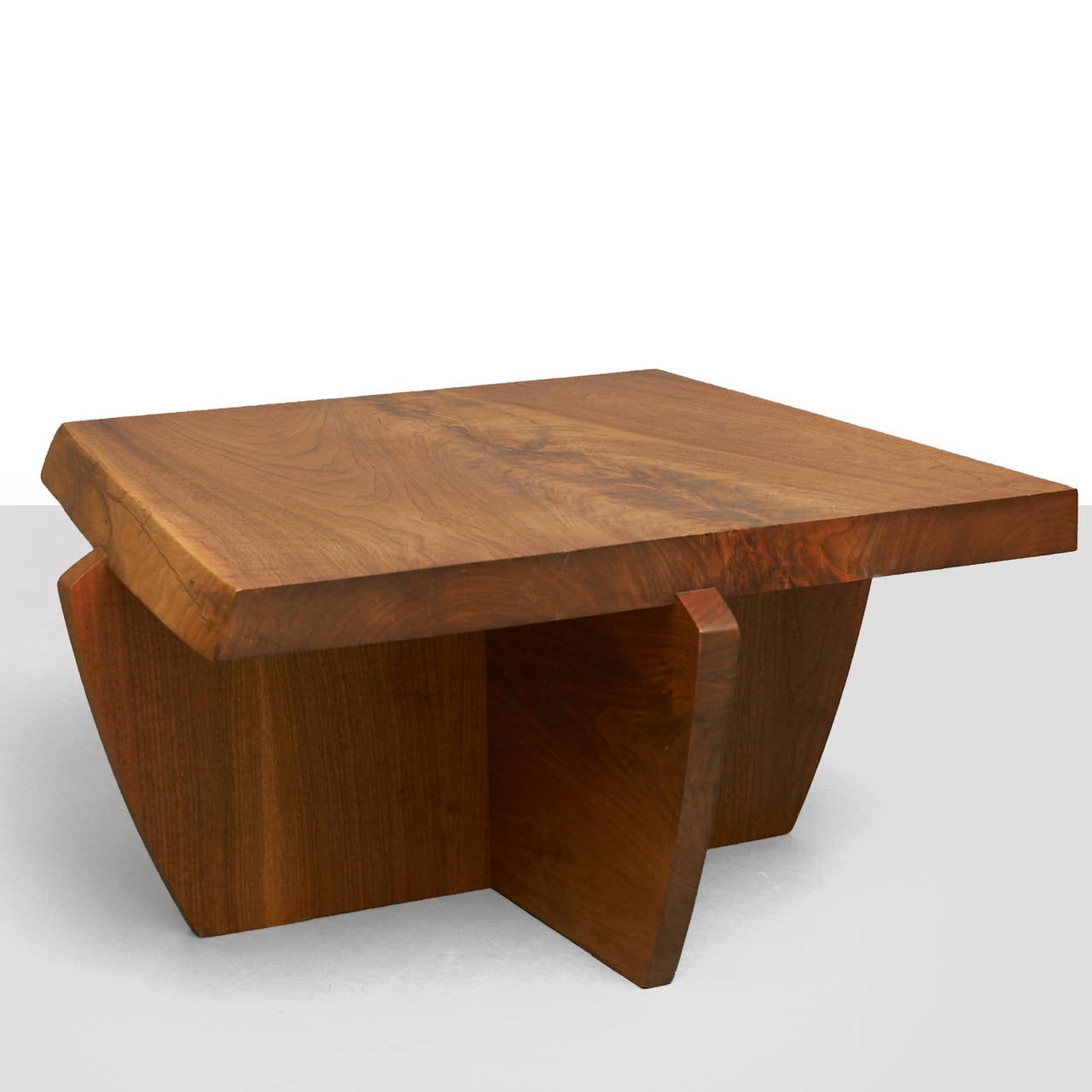 A “Gabellini” coffee table by George Nakashima from the Greenrock series, the table. Designed by George Nakashima - this version executed by his daughter Mira. Slab top and legs with free edge. Signed and dated to underside.
