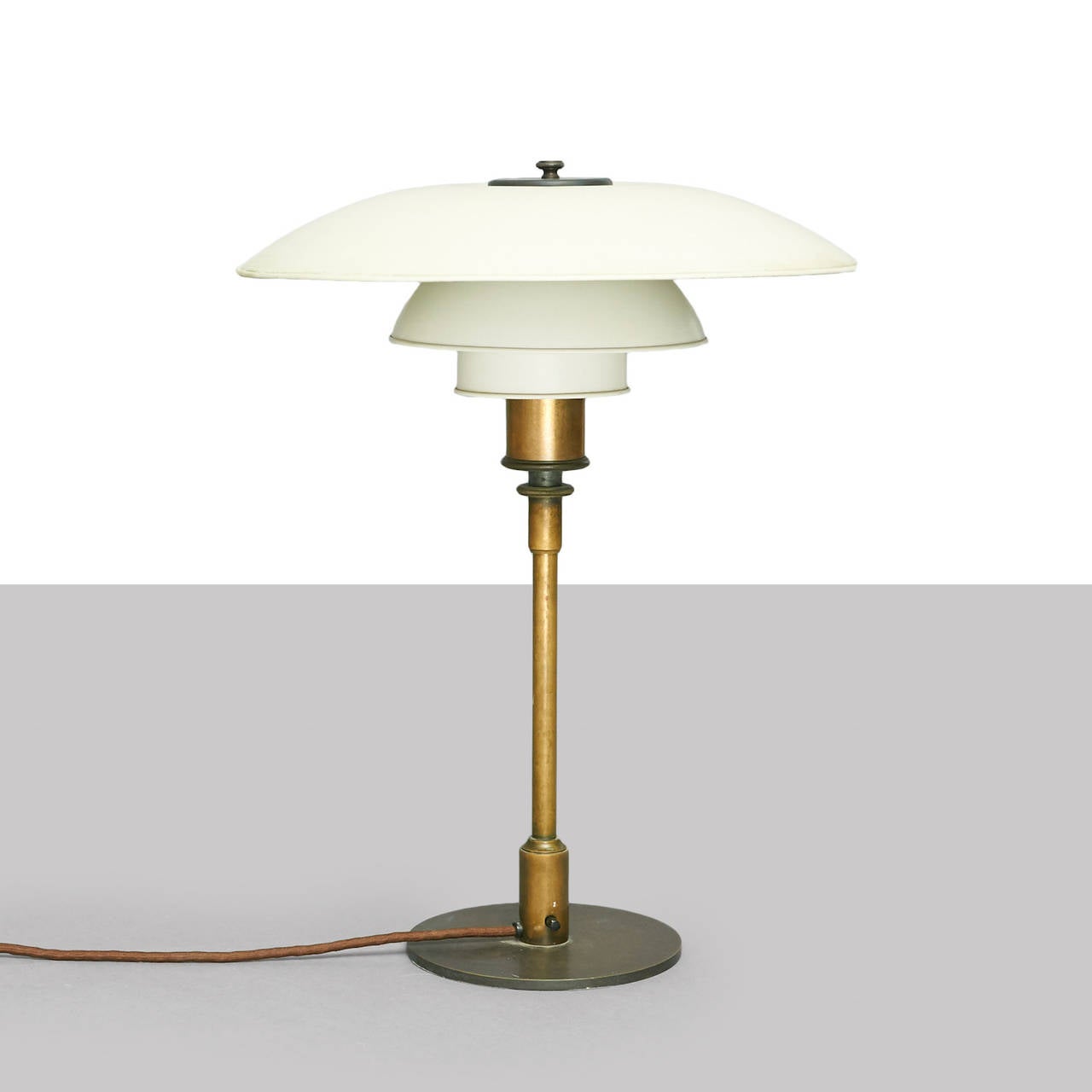 PH4/3, table lamp with brass stand, contact box as well as top disc and screw, cast shade holder, original 4/3 white-lacquered copper shade set. Stamped pat. appl. (highly valued to PH collectors) Produced by Louis Poulsen in the period 1926-1928.