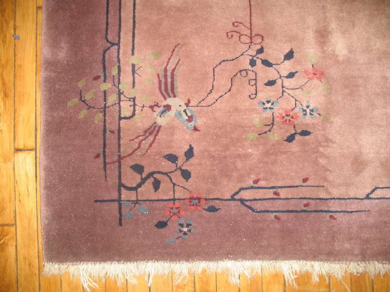 An authentic one of a kind 5 ft square Chinese art deco rug.
