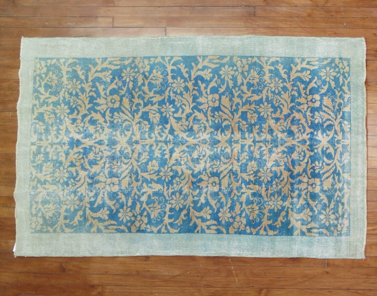 Mid-Century Turkish rug with a hard to find turquoise color.

3'11' x 6'7''