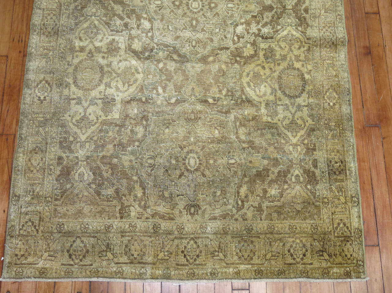 Early 20th century Persian Tabriz rug. Gold, khaki, brown.

4' x 5'4''