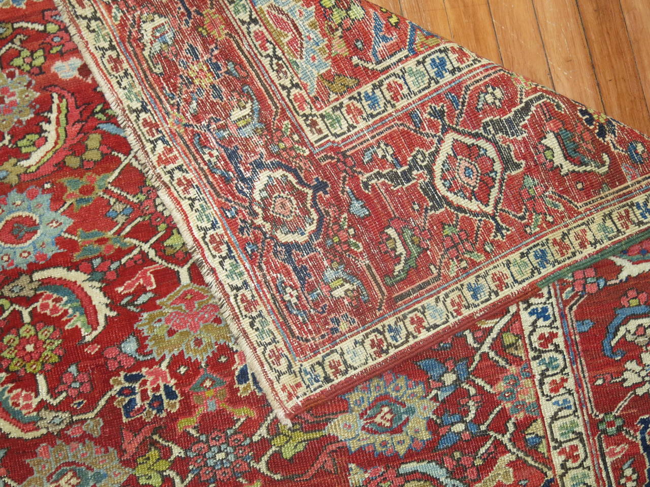 Rare size all-over motif Serapi rug on a matching brownish red colored ground and border.

4'8'' x 8'6''