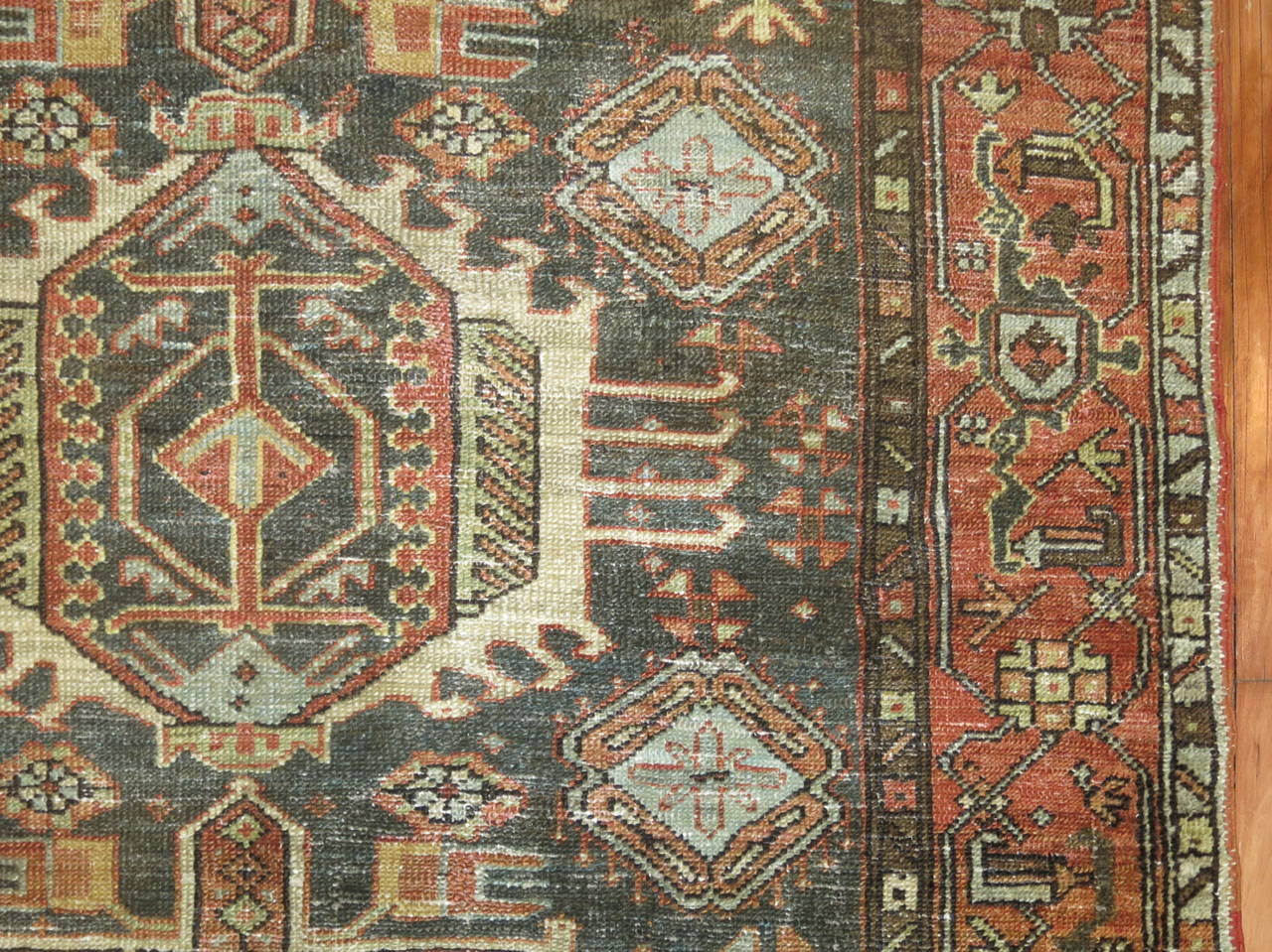 Produced in the Karajeh (also know as Karadja), a small village near Tabriz these rugs are distinguished by their use of triple and all-over medallions. Although the standard Heriz medallion is used, smaller Karajeh Persian rugs are ornamented with