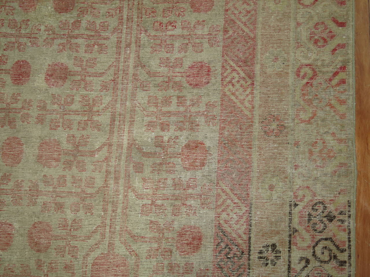 Vintage Khotan with all-over pomegranate motif.