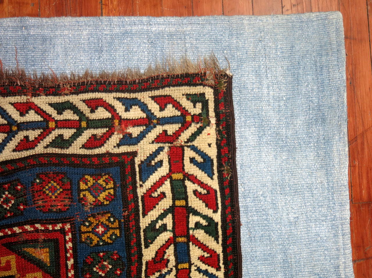 Wool Antique Caucasian Rug on Kilim For Sale