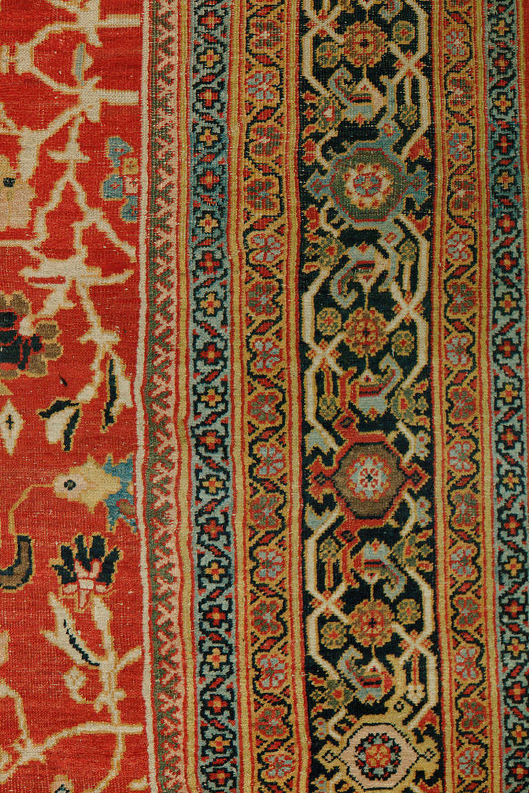 A breathtaking antique late 19th century Persian ZIegler Sultanabad rug with fascinating colors and an interesting all-over palette. 

Antique Sultanabad rugs are one of the few 20th century Persian weaving groups that produced a great variety of