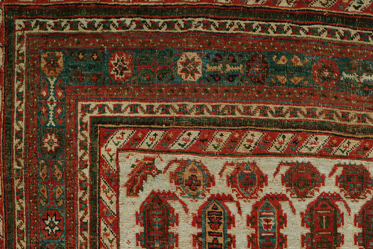 A remarkable tribal Ghashgai Gallery rug with an blue background, teal border with an all-over paisley motif pattern. The vibrant glowing colors and multiple borders make this piece exceptional and rare for its kind. Rug was woven in the city of