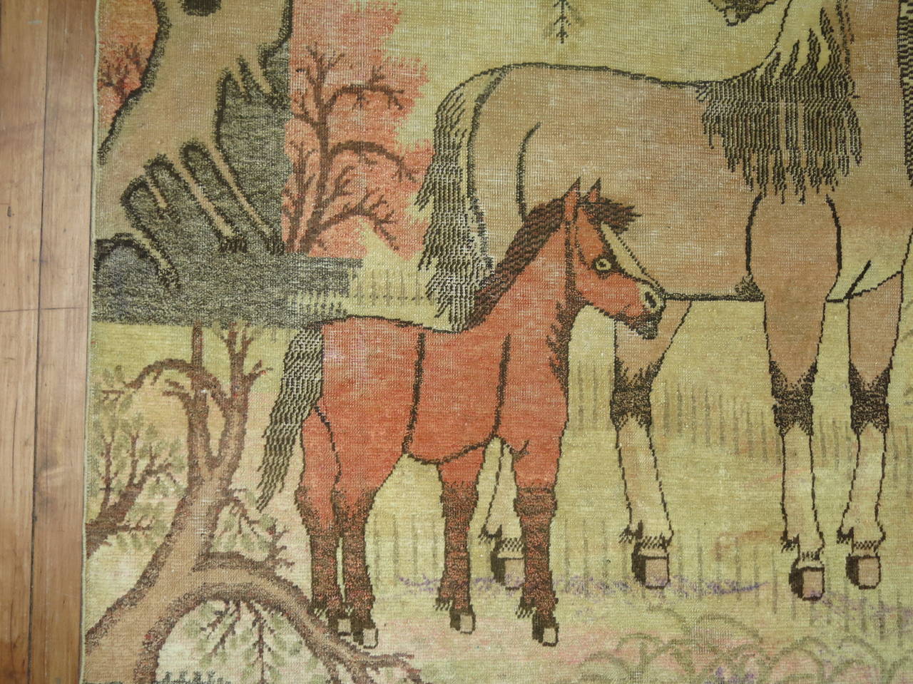 East Turkestani Antique Pictorial East Turkestan Rug with two horses