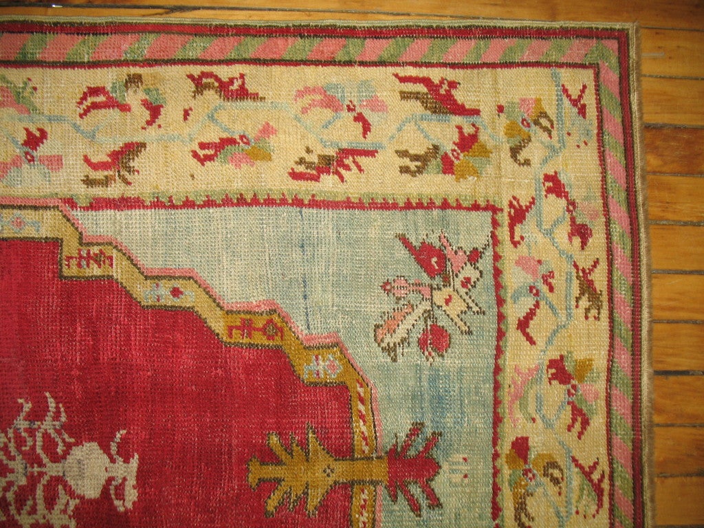 A graceful finely woven Turkish rug with romantic colors.