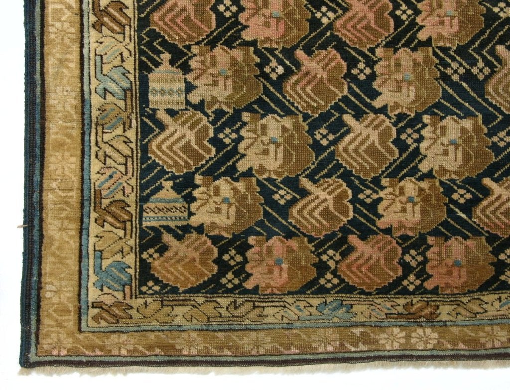 Finely woven early 20th century handmade Kuba rug in easy-going earthy palette.