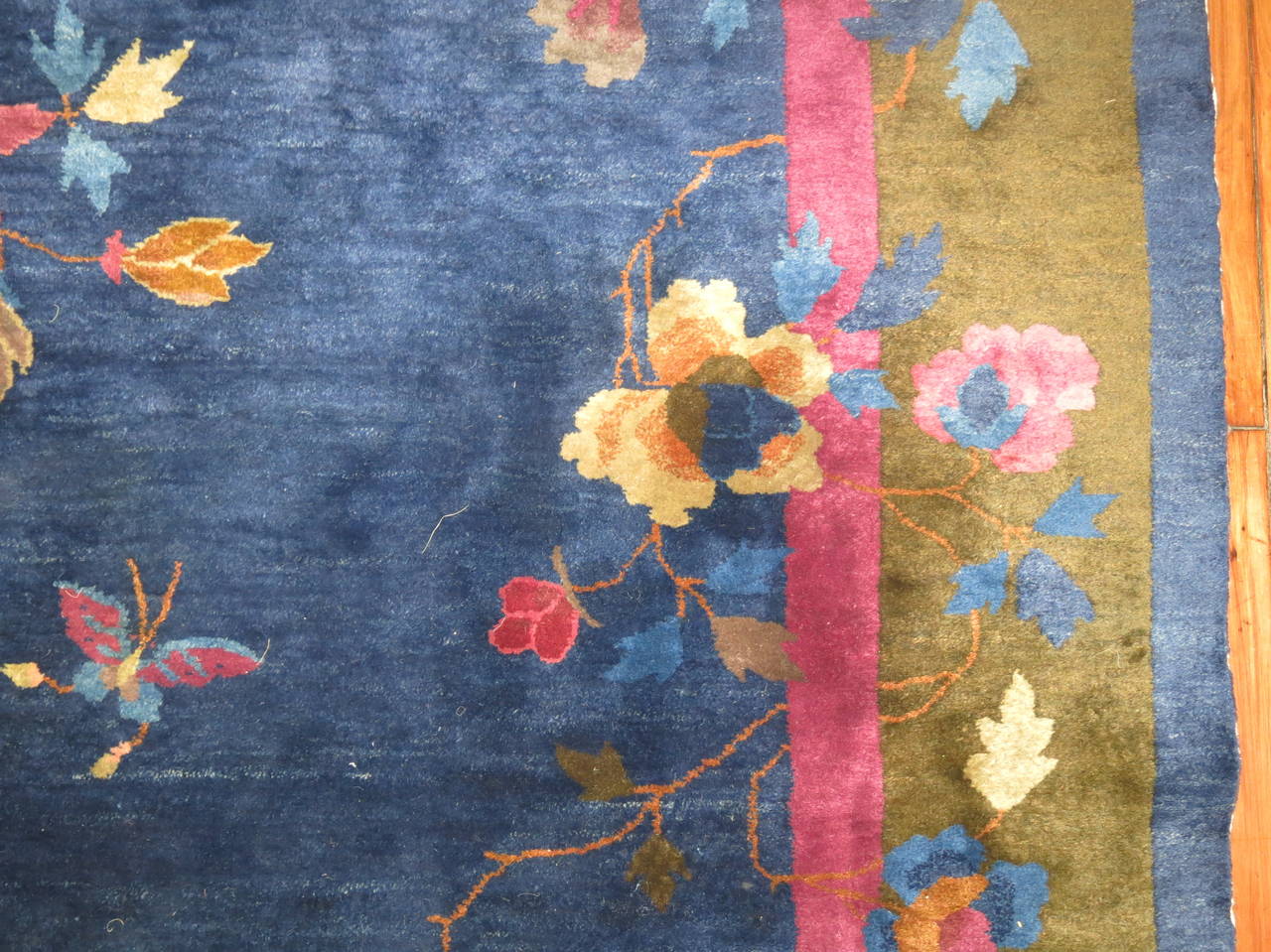 A pristine Chinese Art Deco rug in lovely blues and pinks. Even Full pile excellent condition