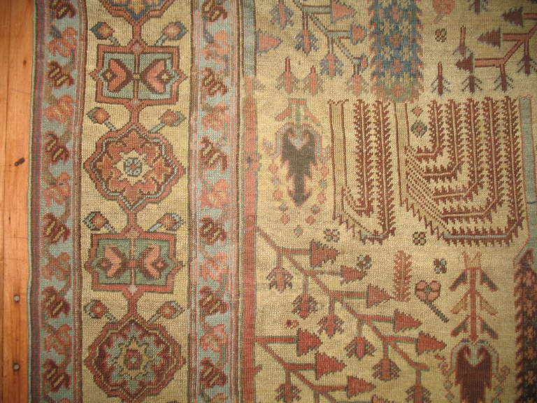 20th Century Antique Persian Bakshaish Rug