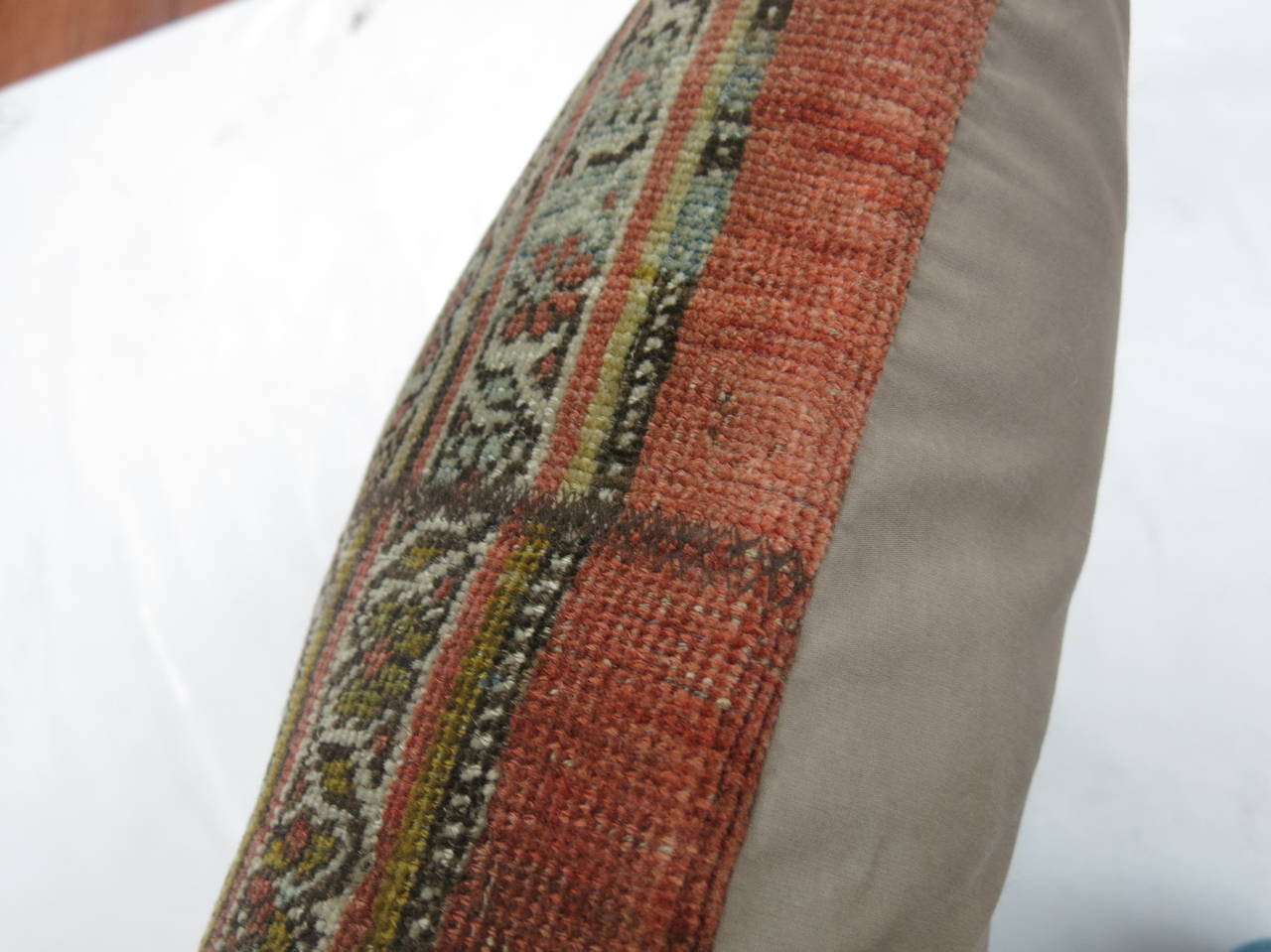 Pillow made from an antique Persian Bidjar rug with a zipper closure included.