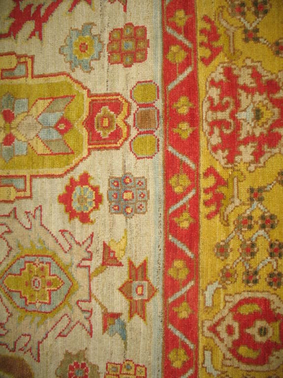 A vintage turkish oushak rug 1