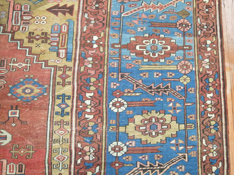 Hand-Woven Antique Persian Bakshaish Carpet in Rustic Tones For Sale