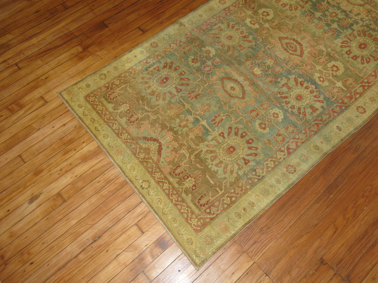 A fine quality early 20th century one of a kind Persian Malayer rug.