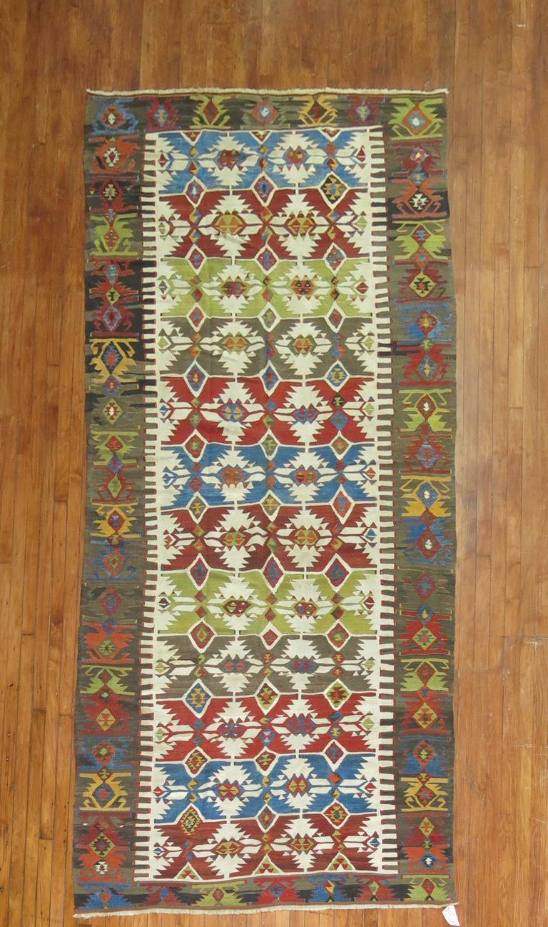 An authentic early 20th century gallery size flat-weave Kilim.