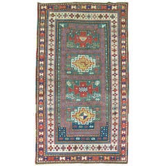 Antique Kazak Rug
