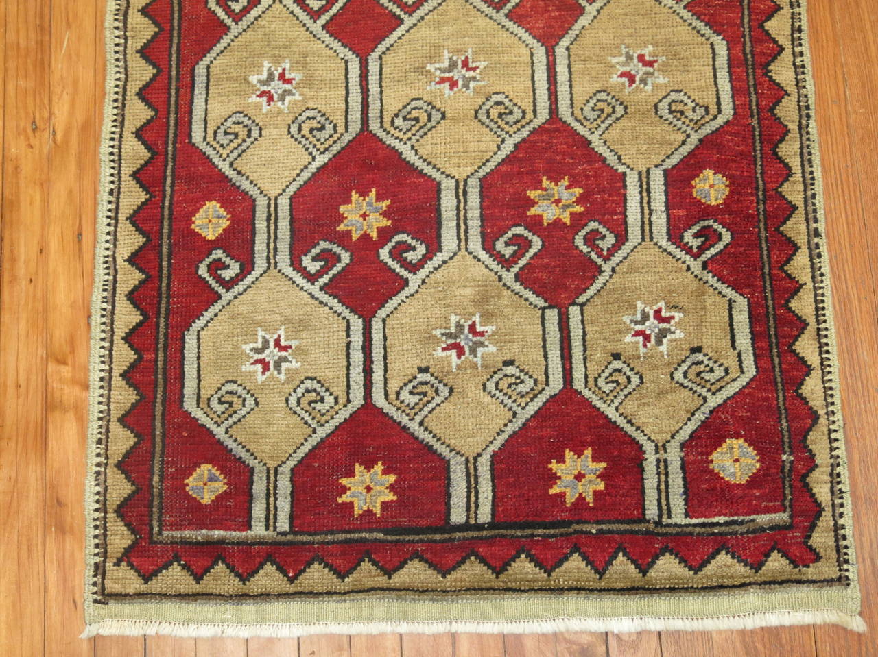 Vintage Turkish rug with all-over camel motif on a crimson red background,

circa mid-20th century, measures: 2'10