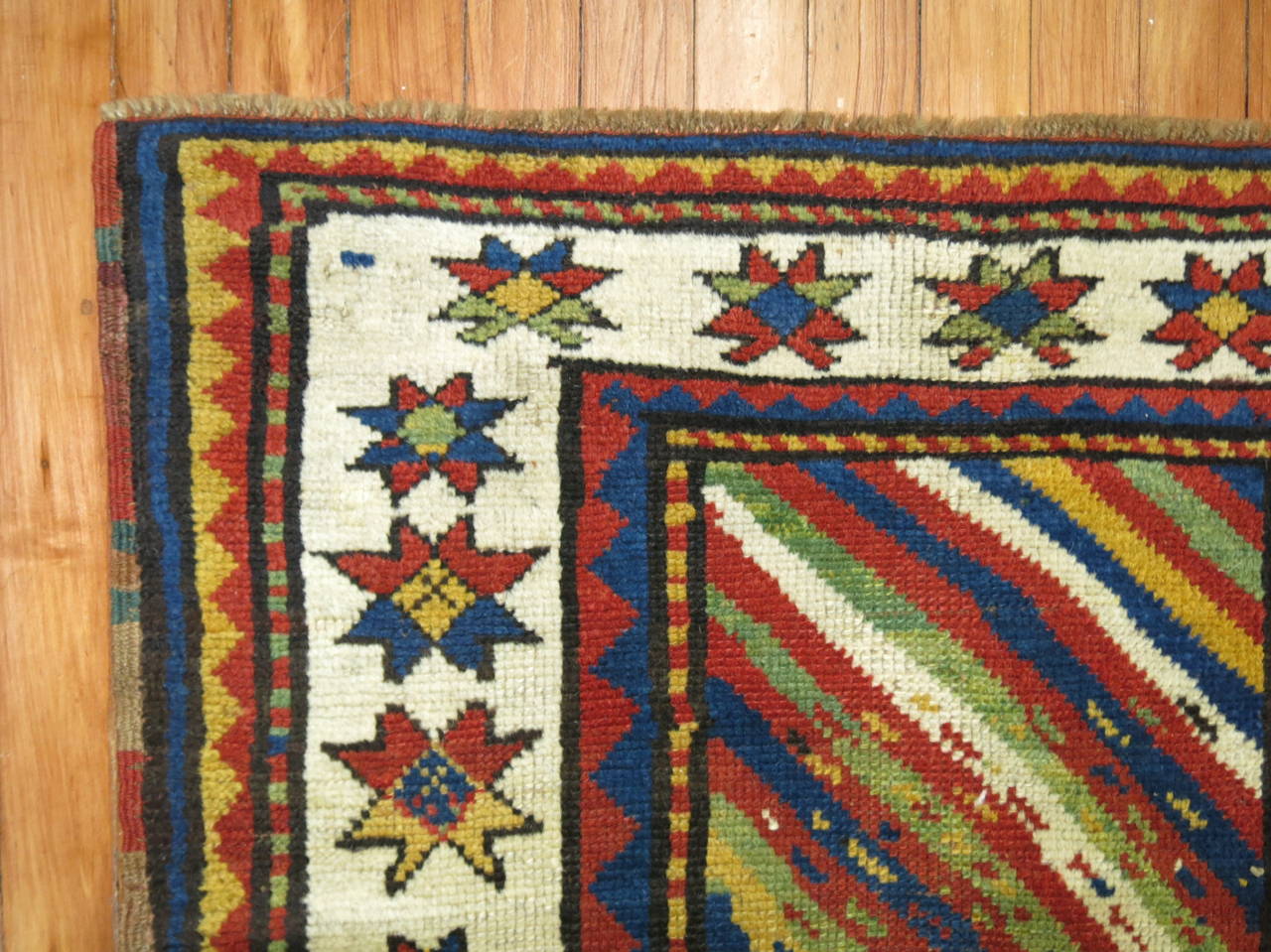 A cheerful early 20th century Caucasian rug.