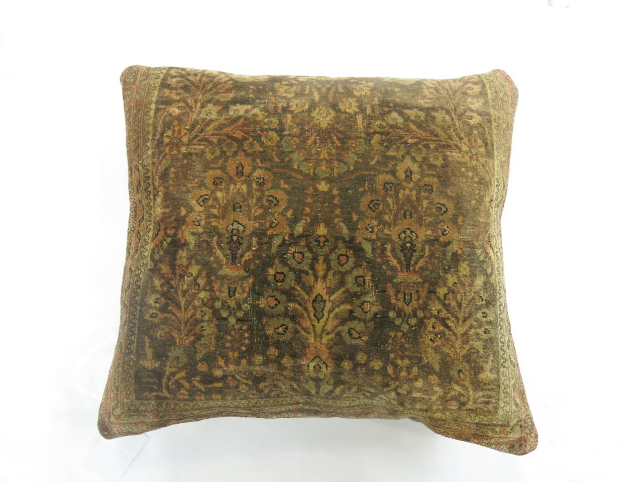 An exquisite set of large square pillows from an antique Persian Sarouk Ferehan rug. Backed in khaki cotton with zipper closures on each. Great texture and patina. Each pillow measures 20'' x 22''. 