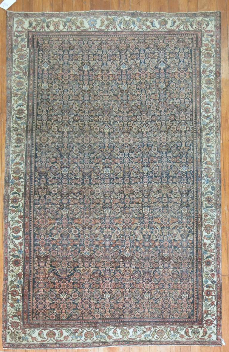 Timeless and priceless best describes this authentic Persian Sarouk Ferehan rug with a Classic all-over Herati motif.

Measures: 4'1'' x 6'4''.