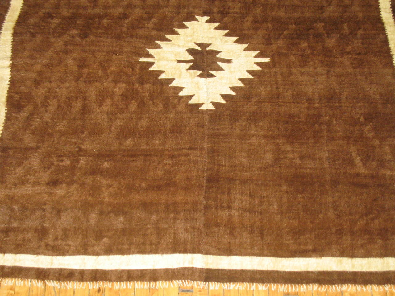 A square size turkish mohair Rug in brown and ivory.