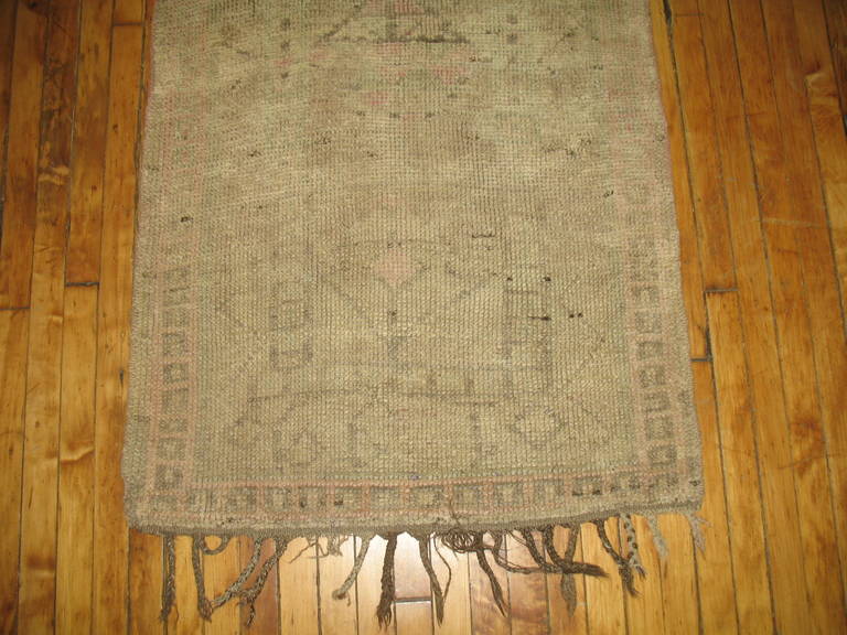 A midcentury one of a kind Moroccan runner with light cream and pink accents,

circa 1940. Measures: 2'10