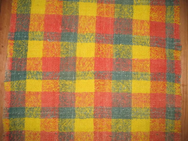 Mid-Century Turkish rag rug with plaid design with bright colors that will intensify any hallway.